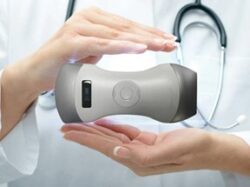 Displaying the Point of Care Ultrasound compact size fitting in between two hands